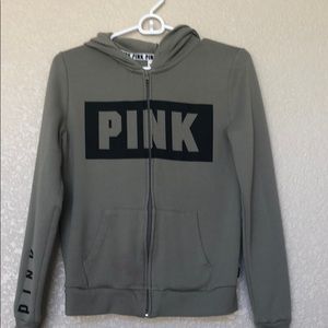 A zip up green hoodie